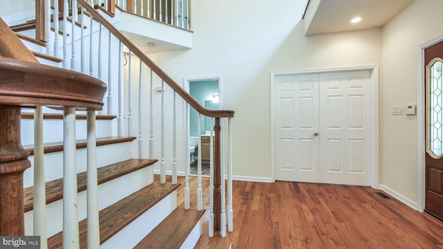 foyer entrance with hardwood / wood-style floors