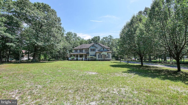 view of front of home with a front lawn