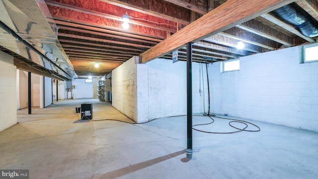 basement featuring plenty of natural light