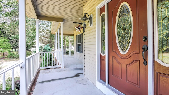 entrance to property with a porch