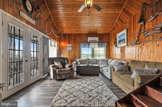 living room featuring french doors, dark hardwood / wood-style flooring, wooden walls, and wooden ceiling