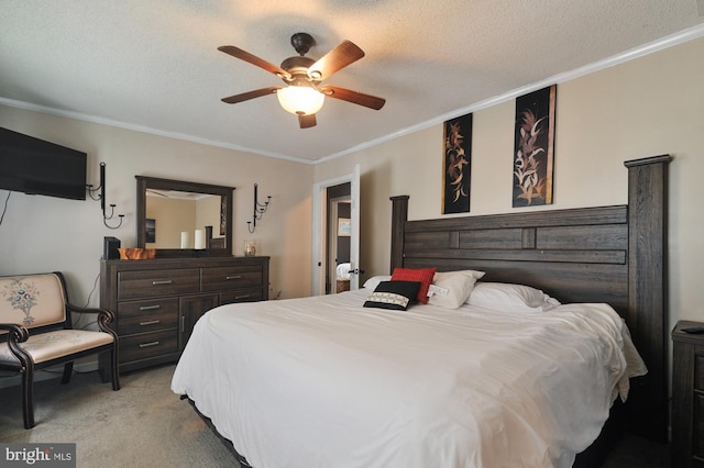 bedroom with crown molding, a textured ceiling, ceiling fan, and light colored carpet