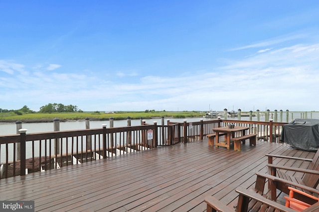 dock area featuring a water view