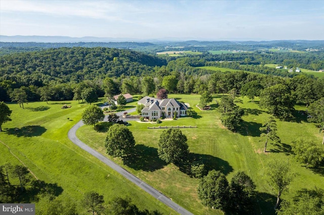 bird's eye view featuring a view of trees