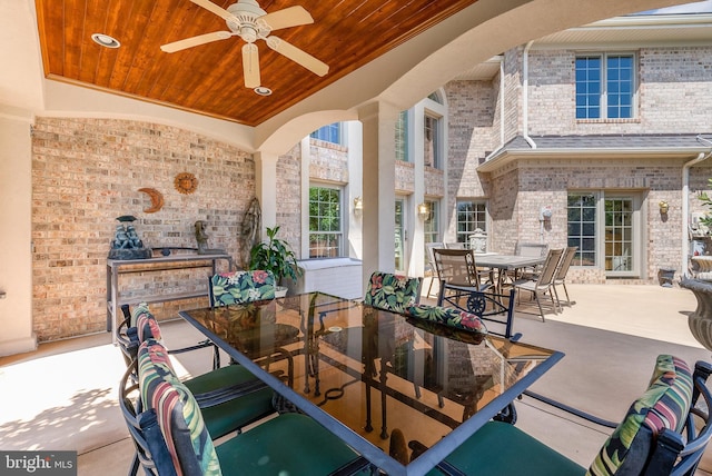 view of patio / terrace featuring outdoor dining area and ceiling fan