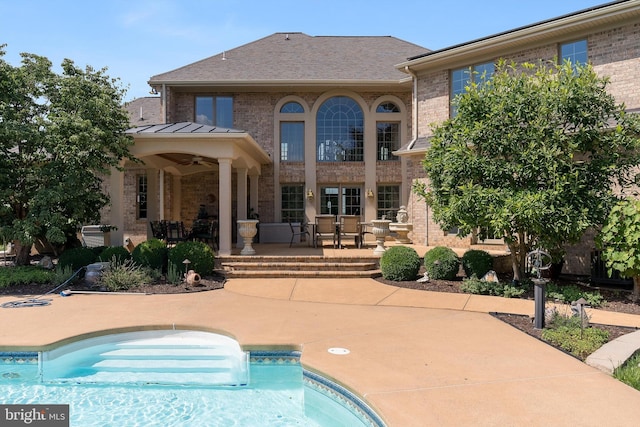 pool featuring a patio area