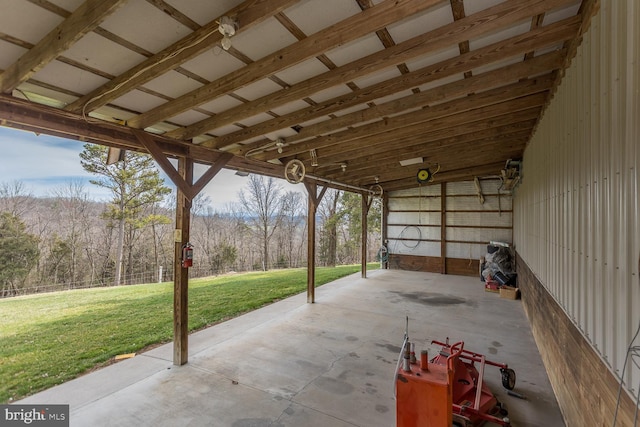 view of patio with a forest view