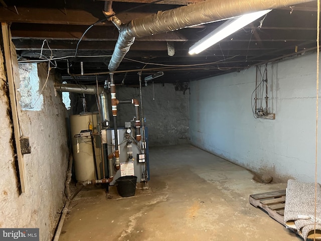 basement featuring gas water heater