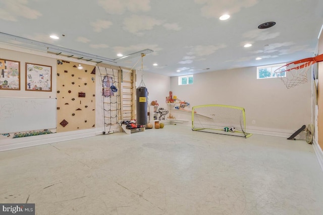 interior space with water heater and concrete flooring