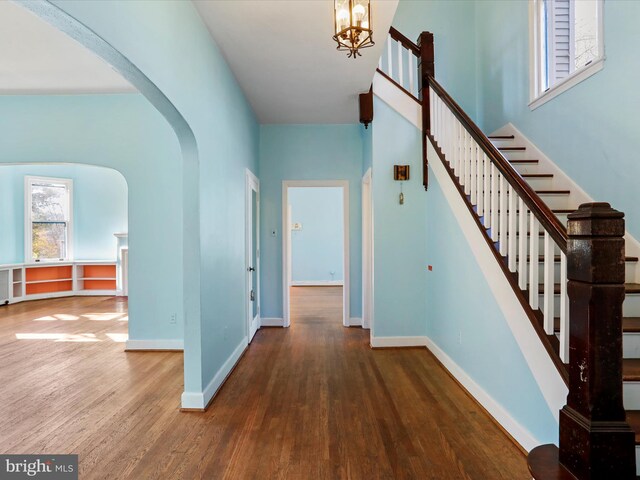 corridor featuring dark hardwood / wood-style flooring