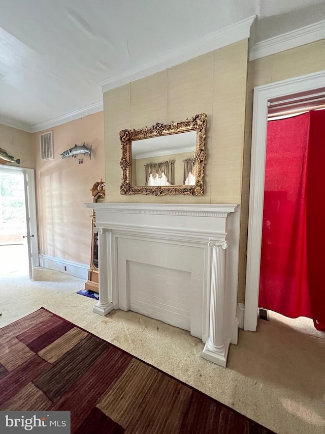 interior details featuring crown molding, carpet flooring, and a fireplace