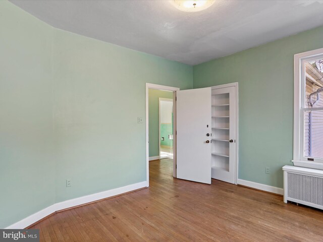 bathroom featuring vaulted ceiling and toilet