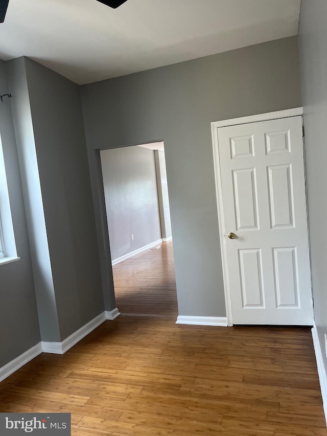 interior space with hardwood / wood-style floors