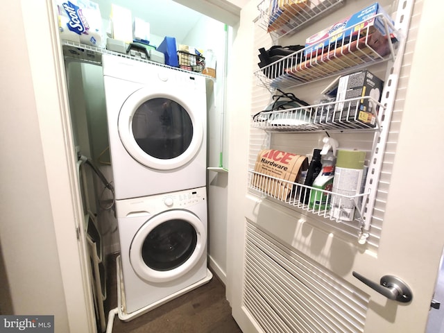 laundry room with stacked washer and dryer