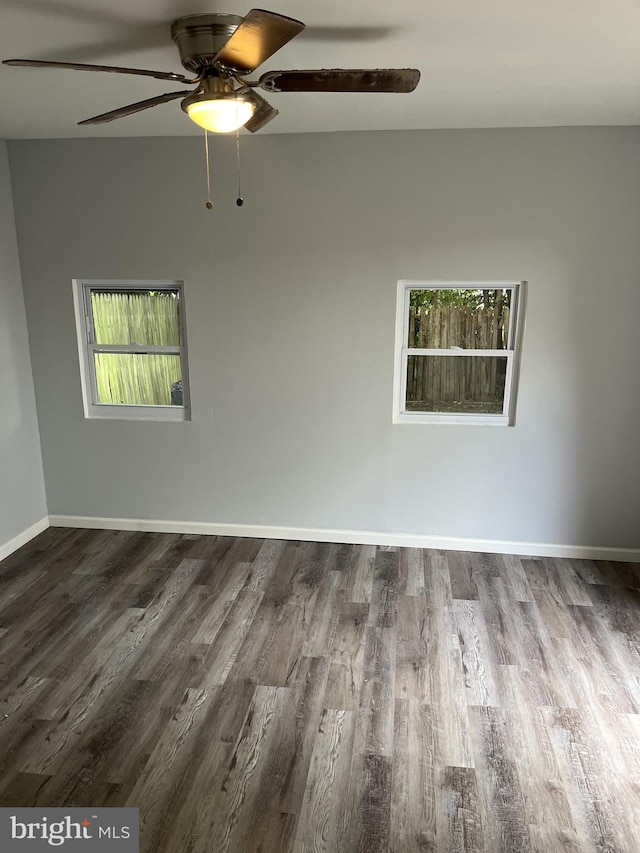 unfurnished room featuring ceiling fan and wood-type flooring