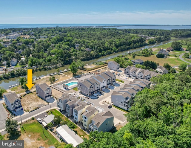 birds eye view of property featuring a water view