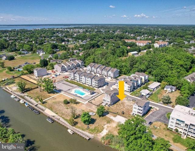 aerial view with a residential view and a water view