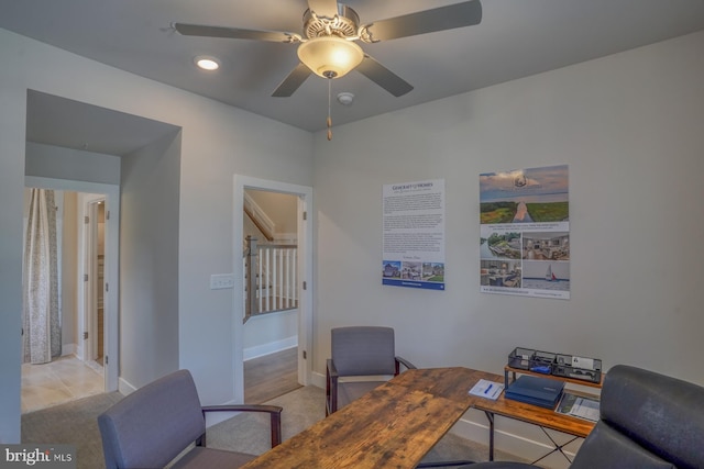 office area with light tile patterned flooring and ceiling fan