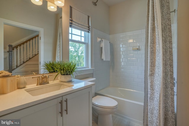 full bathroom with vanity, shower / bath combo, tile patterned flooring, and toilet