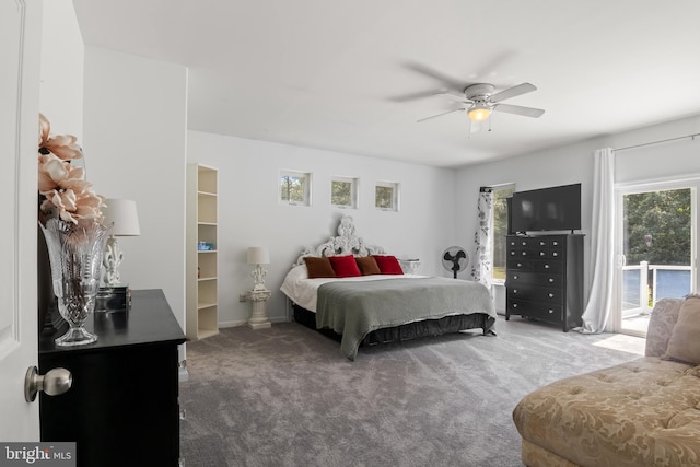 carpeted bedroom featuring access to exterior and ceiling fan