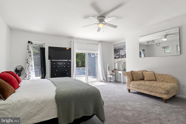 carpeted bedroom with ceiling fan and access to outside