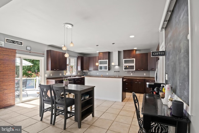 dining room featuring recessed lighting and light tile patterned flooring