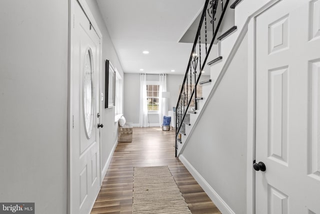 corridor with wood-type flooring