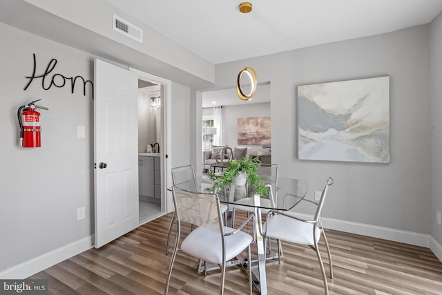 dining room featuring hardwood / wood-style floors