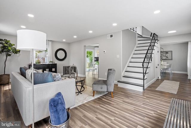 living room with wood-type flooring