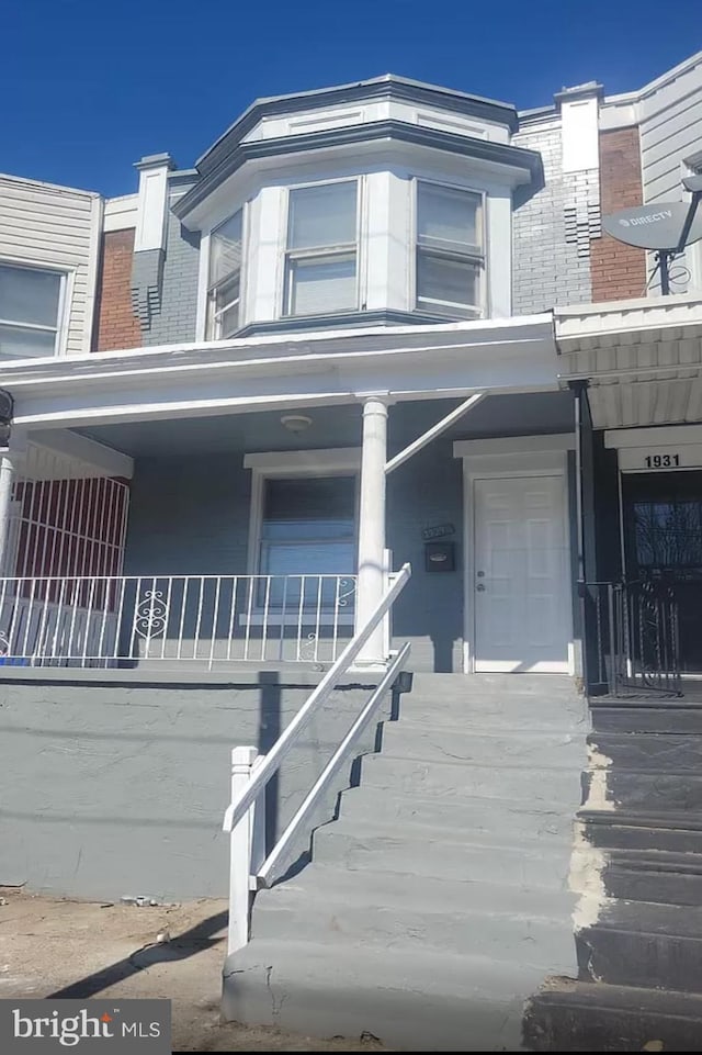 exterior space featuring covered porch