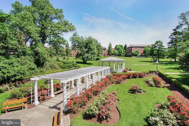 exterior space featuring a yard and a gazebo