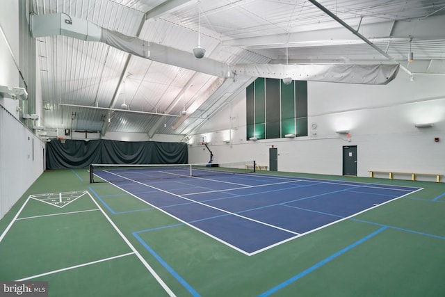 view of tennis court featuring basketball court