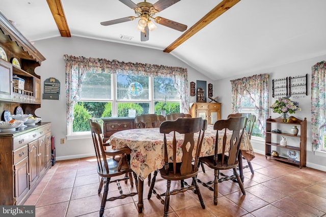 tiled dining area with lofted ceiling with beams and ceiling fan