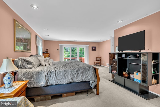 bedroom featuring light carpet