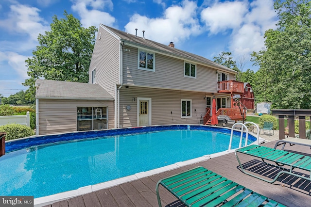 view of pool with a deck