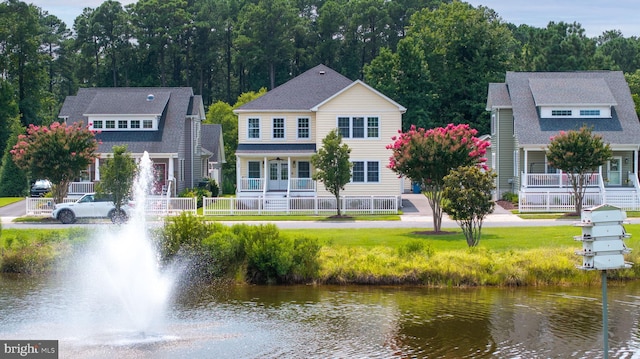 exterior space with a water view