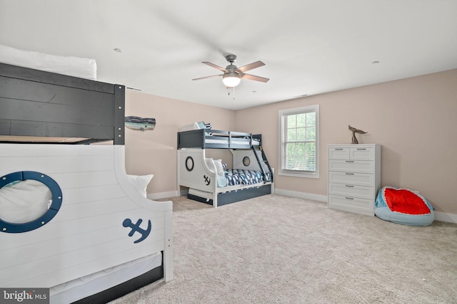 bedroom featuring light carpet