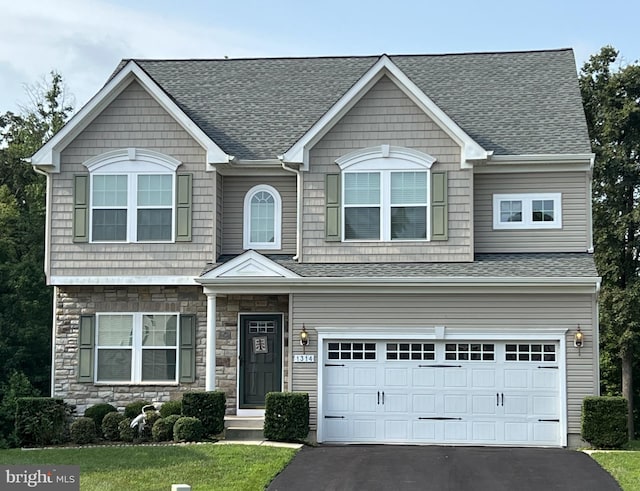 view of front of house with a garage