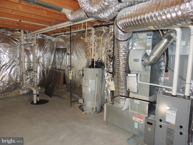 utility room featuring gas water heater