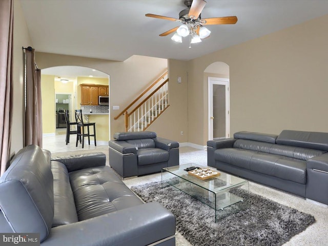 living room with ceiling fan