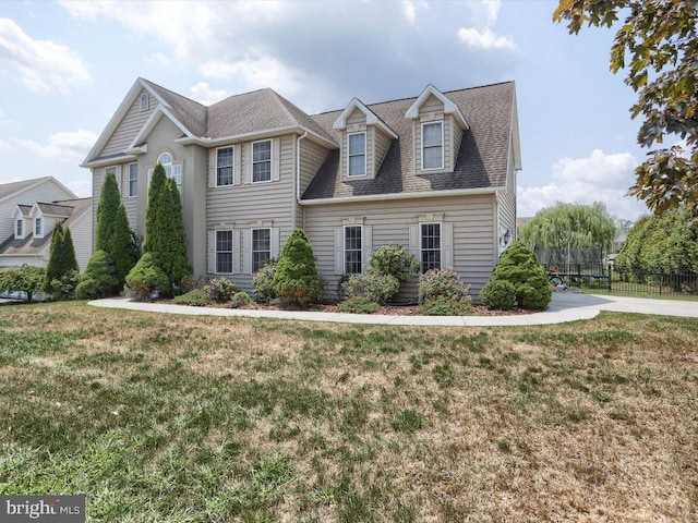 view of front of house with a front lawn