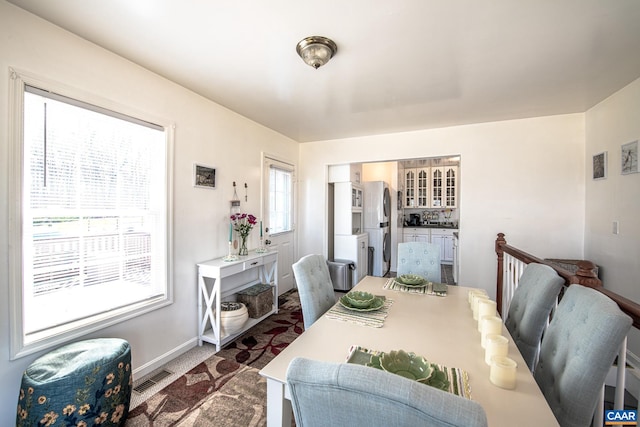 view of carpeted dining area