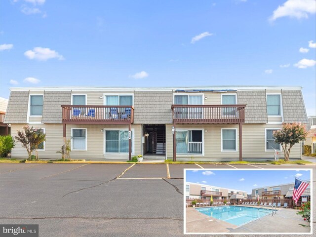 exterior space with a community pool