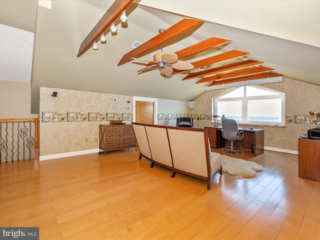 office with lofted ceiling with beams, hardwood / wood-style floors, and ceiling fan