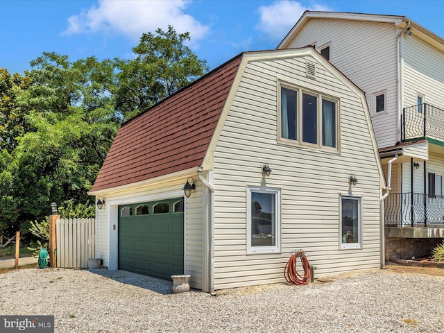 view of property exterior featuring a garage