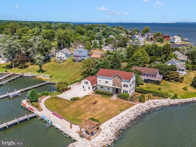 bird's eye view with a water view