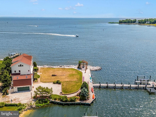 drone / aerial view featuring a water view