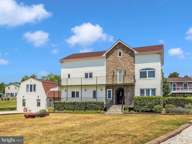 view of front of home with a front yard