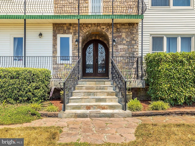 doorway to property with french doors