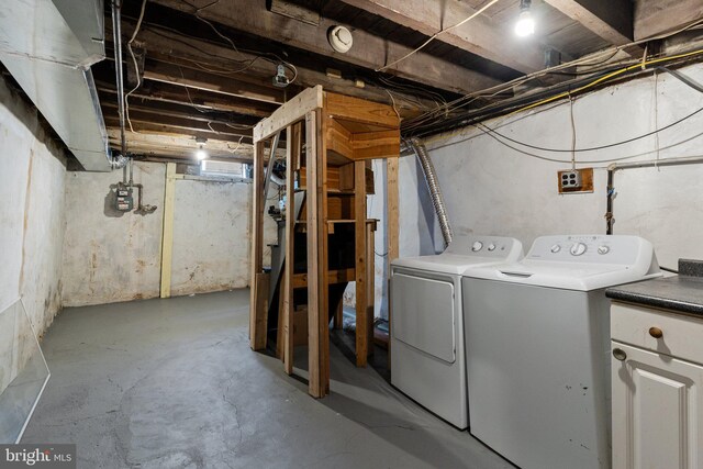 basement featuring washer and dryer